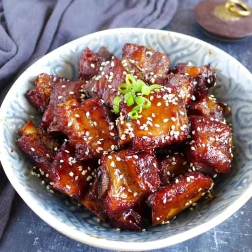 yop view of Sweet & Sour Pork Baby Back Ribs garnished with sesame seeds