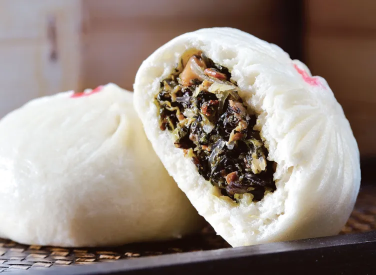 Chicken & Mushroom Buns shows the filling of chicken and mushrooms from the side cutting of bun