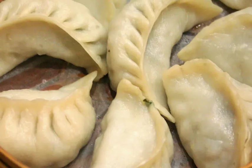 closeup of Cod Dumplings placed for presentation