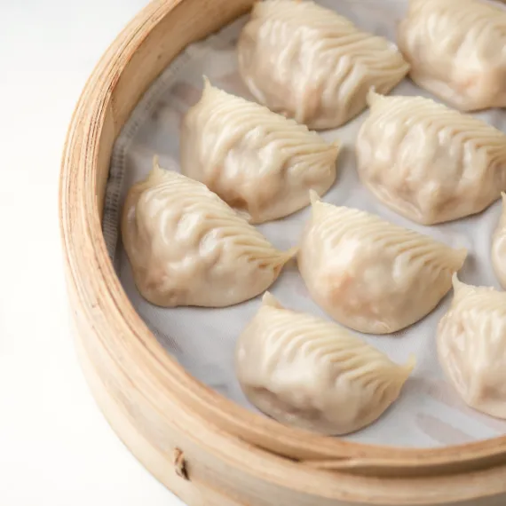 Kurobuta Pork Dumplings placed in tray for taste