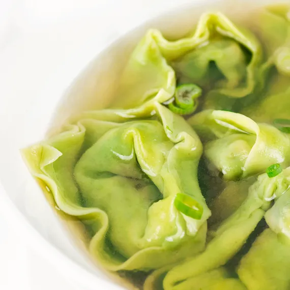 Closeup from the top of Vegan Wonton Soup showing the veggies