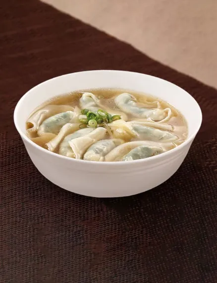 Vegetable & Kurobuta Pork Wonton Soup in a bowl ready to serve